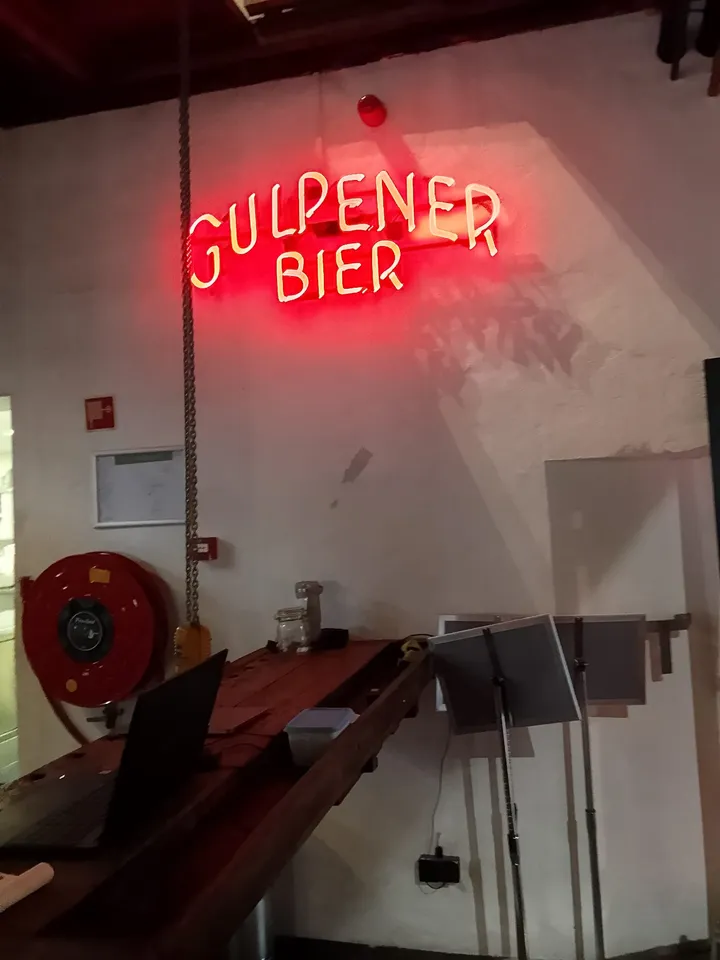 The Gulpener Bier neon sign inside the brewery